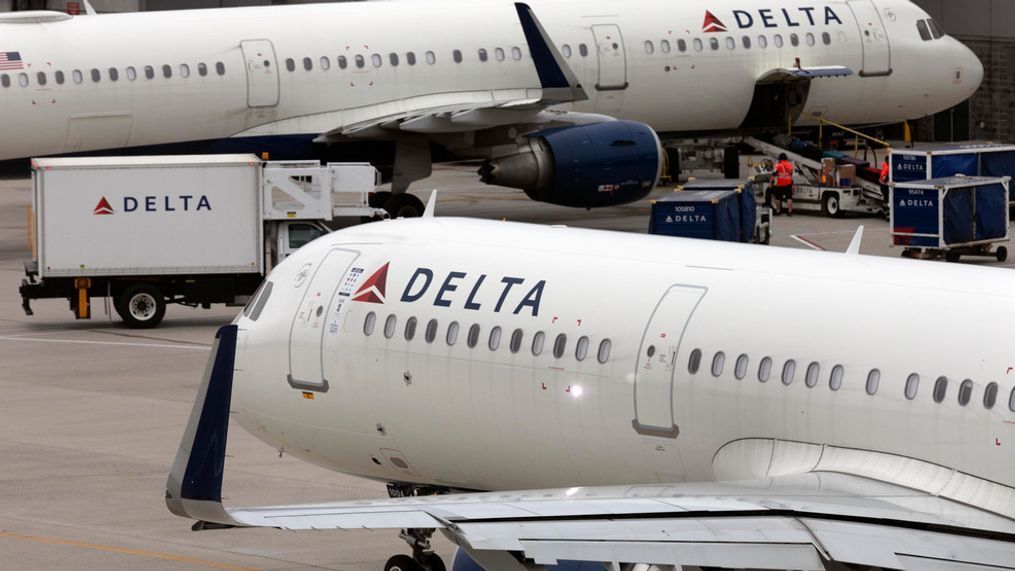 FILE - A Delta Air Lines plane leaves the gate on July 12, 2021, at Logan International Airport in Boston. (AP Photo/Michael Dwyer, File)