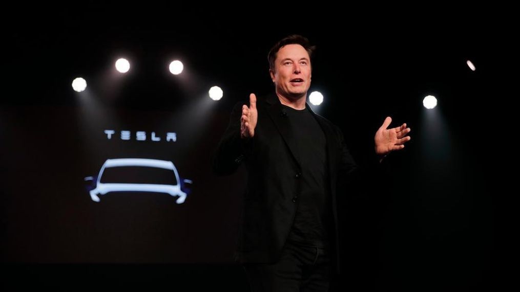 In this March 14, 2019, file photo Tesla CEO Elon Musk speaks before unveiling the Model Y at Tesla's design studio in Hawthorne, Calif.  A federal judge will hear oral arguments Thursday, April 4, about whether Tesla CEO Elon Musk should be held in contempt of court for violating an agreement with the U.S. Securities and Exchange Commission.(AP Photo/Jae C. Hong, File)