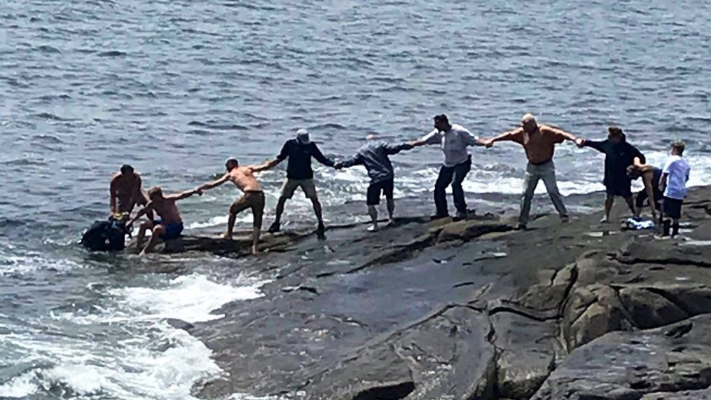 A York town employee jumped into the water near Nubble Light to save a diver from drowning Monday. (Lois Griswold)