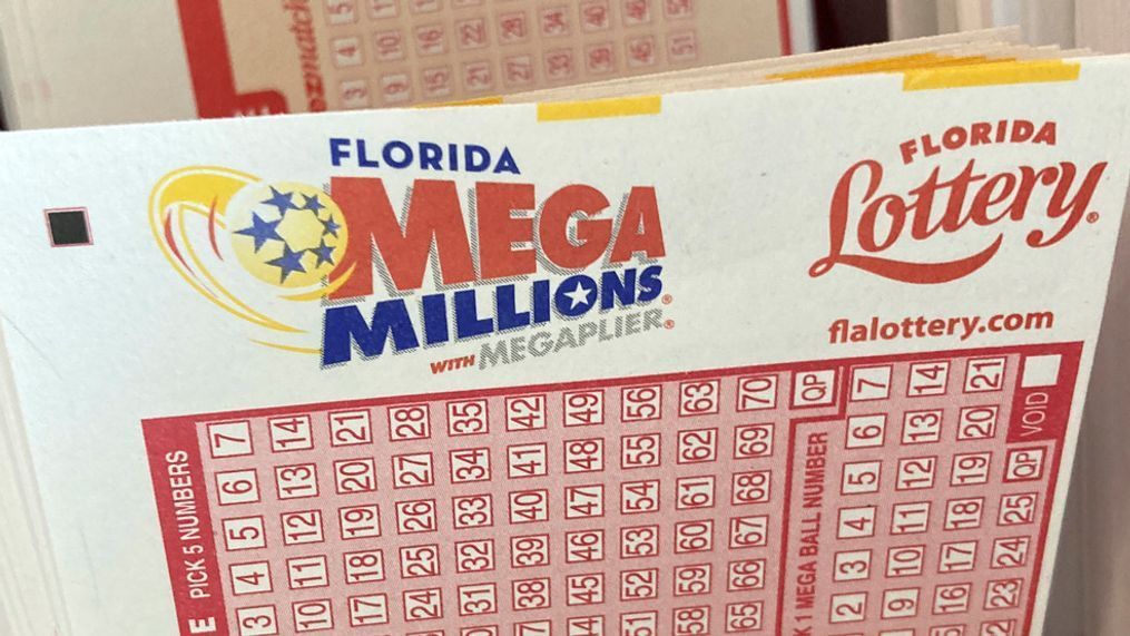 Mega Millions lottery playing slips are shown at a supermarket kiosk, Monday, Jan. 2, 2023, in Surfside, Fla. The jackpot for the Tuesday drawing is estimated at $785 million. (AP Photo/Wilfredo Lee)