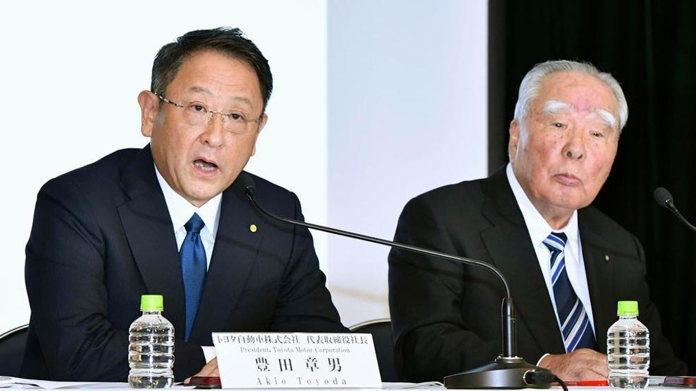 In this Oct. 12, 2016 file photo, Toyota Motor Corp. President Akio Toyoda, left, speaks with Suzuki Motor Corp. Chairman Osamu Suzuki during a news conference in Tokyo.  Japan's top automaker, Toyota, and smaller rival Suzuki announced Wednesday, Aug. 28, 2019, they are partnering in the development of self-driving car technology, as manufacturers around the world grapple with innovations in the industry.(Shigeyuki Inakuma/Kyodo News via AP, File)