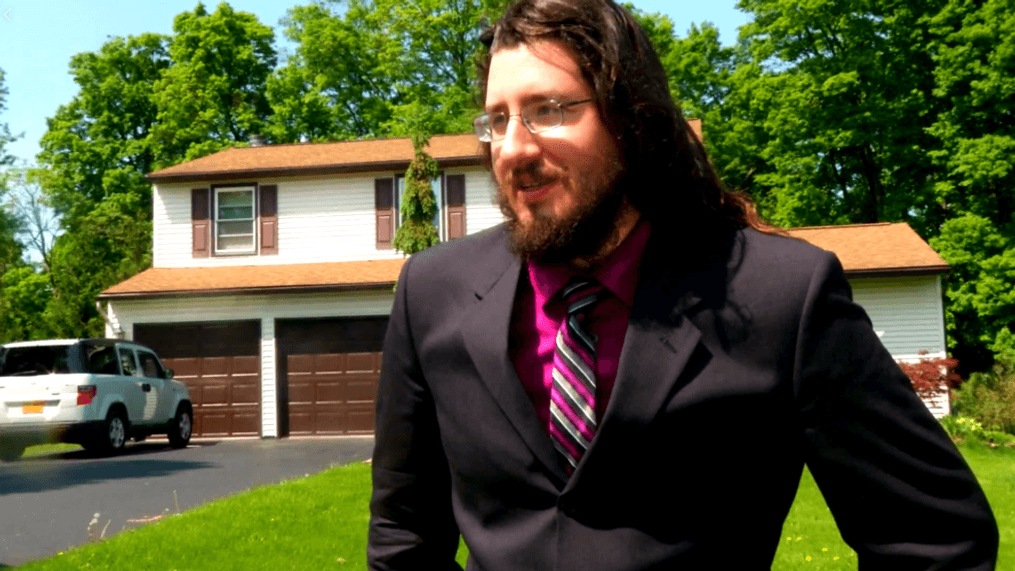 Michael Rotondo speaks outside his parents' Camillus home.