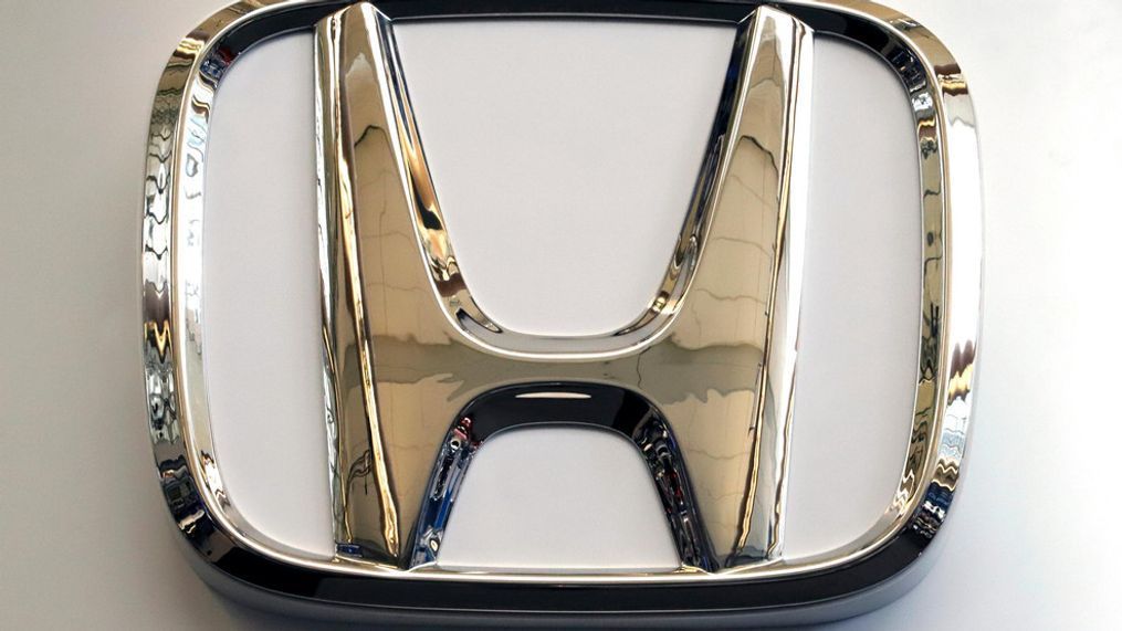 In this Feb. 14, 2019, photo, this photo shows the Honda logo on a sign at the 2019 Pittsburgh International Auto Show in Pittsburgh. Honda will be recalling about 1 million older vehicles in the U.S. and Canada because the Takata driver's air bag inflators that were installed during previous recalls could be dangerous. Documents posted Monday, March 11, 2019, by Canadian safety regulators show that Honda is recalling many of its most popular models for a second time. (AP Photo/Gene J. Puskar)