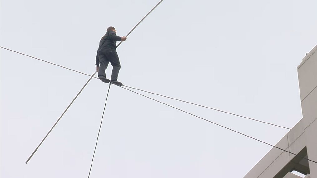 Daredevil walks across high wire over National Harbor. (WJLA)&nbsp;