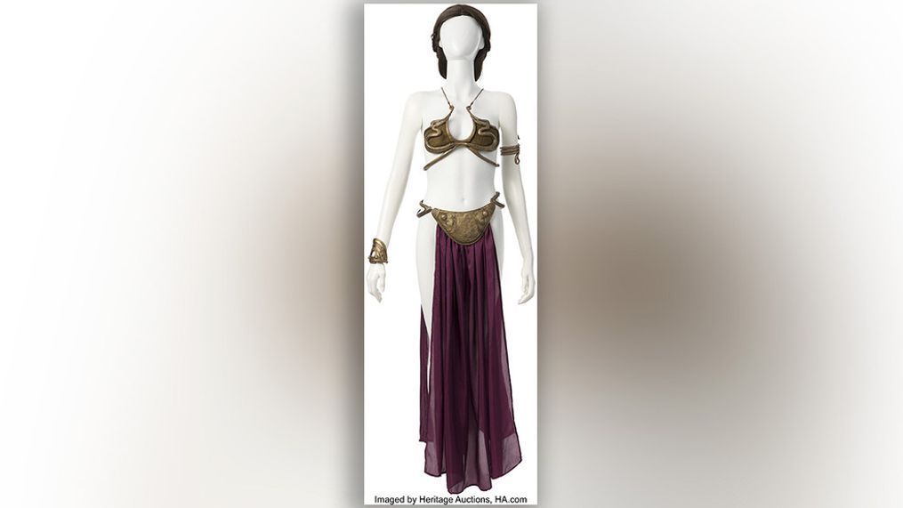 {p}This photo provided by Heritage Auctions shows the gold bikini-style costume that Carrie Fisher wore as Princess Leia while making “Return of the Jedi” in the “Star War” franchise, which was sold for $175,000 during an auction Friday, July 26, 2024. (Heritage Auctions via AP){/p}