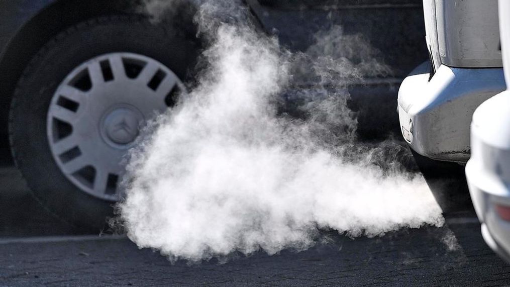 In this Feb. 27, 2018, file photo, a Diesel car runs in Essen, Germany. The German government backed plans to help reduce pollution from diesel vehicles. (AP Photo/Martin Meissner)