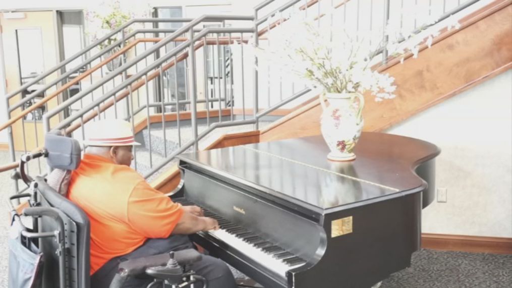 Nelson Dunlap playing the piano. (SBG)