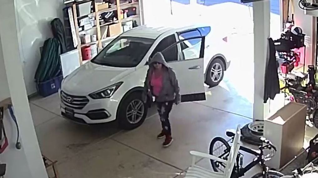 A home surveillance camera caught a bold burglary inside a West Jordan family’s garage where a woman steals tools and flees in a white Hyundai. (Photo: West Jordan Police Department){p}{/p}