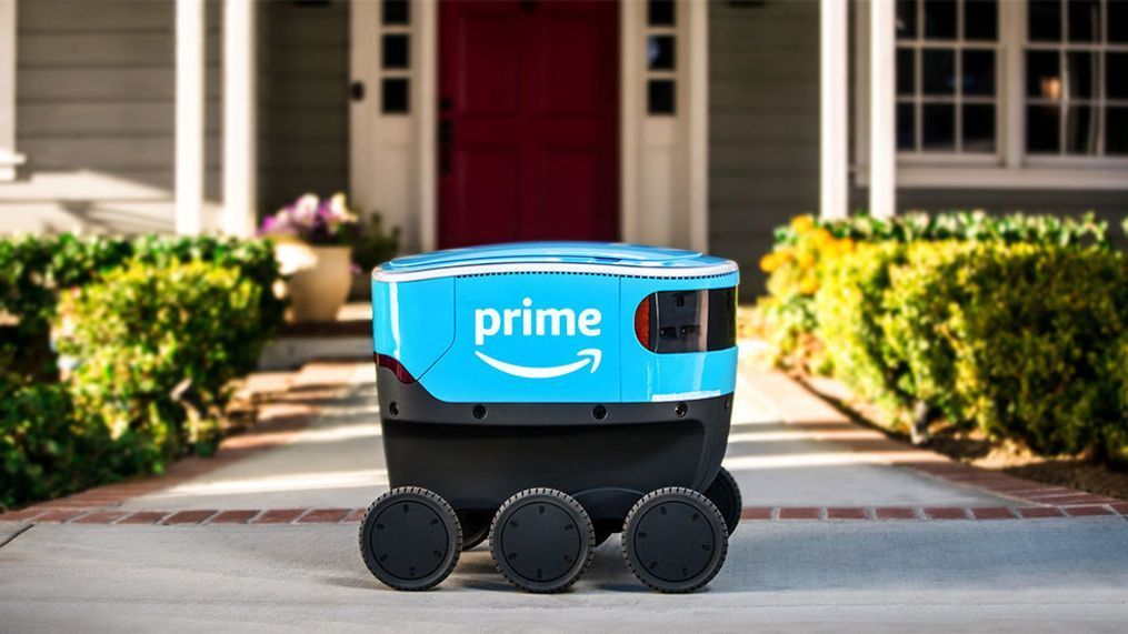 The self-driving robots have six wheels and the Amazon smile logo stamped on the side. (Photo credit: Amazon.com)