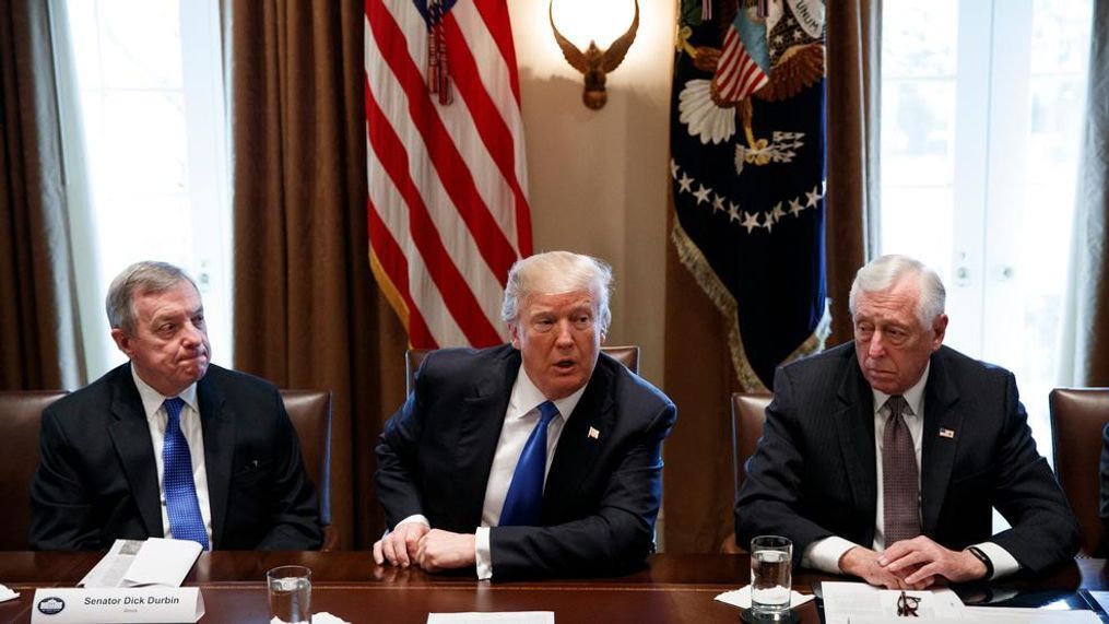 Sen. Dick Durbin, D-Ill., left, and Rep. Steny Hoyer, D-Md. listen as President Donald Trump speaks during a meeting with lawmakers on immigration policy in the Cabinet Room of the White House, Tuesday, Jan. 9, 2018, in Washington. (AP Photo/Evan Vucci)