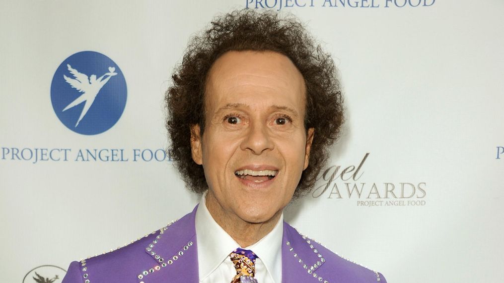 FILE - In this Aug. 10, 2013 file photo, fitness guru Richard Simmons arrives at the Project Angel Food's 2013 Angel Awards in Los Angeles. License Global reported on April 5, 2017, that Simmons has signed a new licensing deal. (Photo by Richard Shotwell/Invision/AP, File)