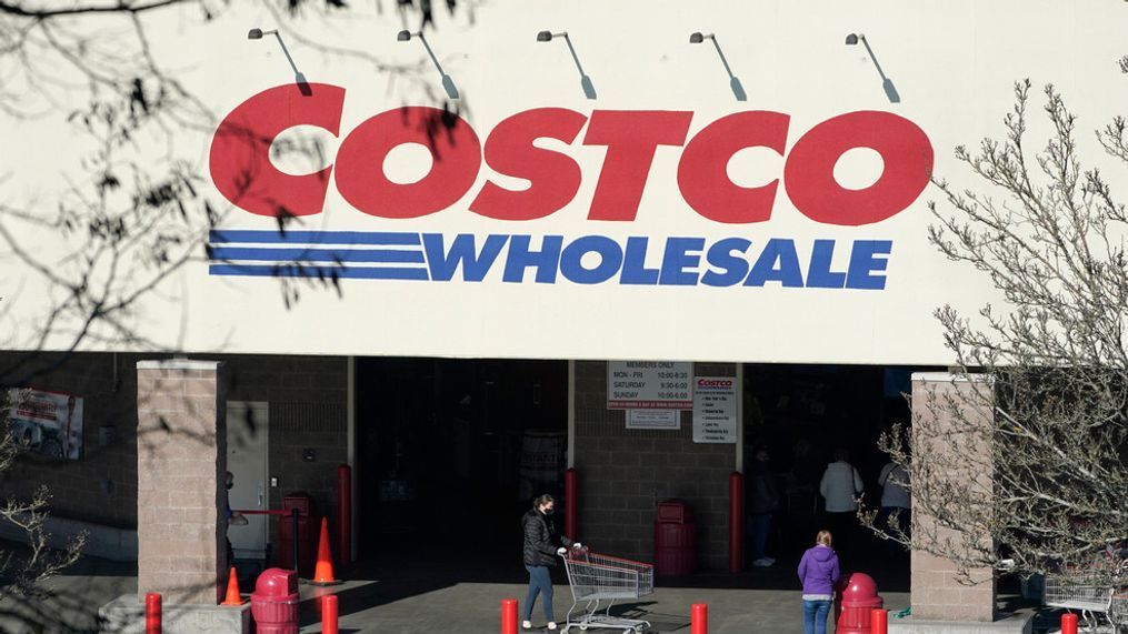 FILE - Shoppers walk into a Costco store, Wednesday, March 3, 2021, in Tacoma, Wash. (AP Photo/Ted S. Warren)