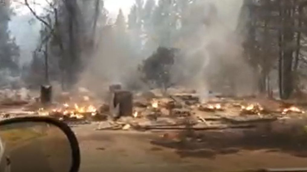 Video taken by Jason Rasmussen shows homes burned by the Slater Fire in Happy Camp.{p}{/p}