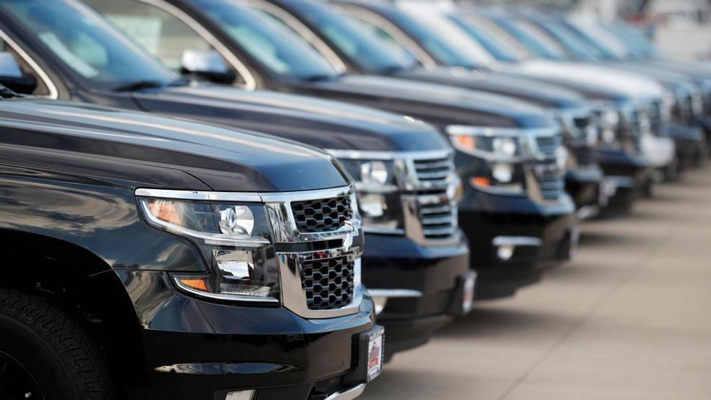 This June 24, 2018, photo shows unsold 2018 Suburbans at a Chevrolet dealership in Englewood, Colo. Automobile sales in the U.S. fell 2% in the first quarter, another sign the nation's economy is starting to slow. (AP Photo/David Zalubowski)