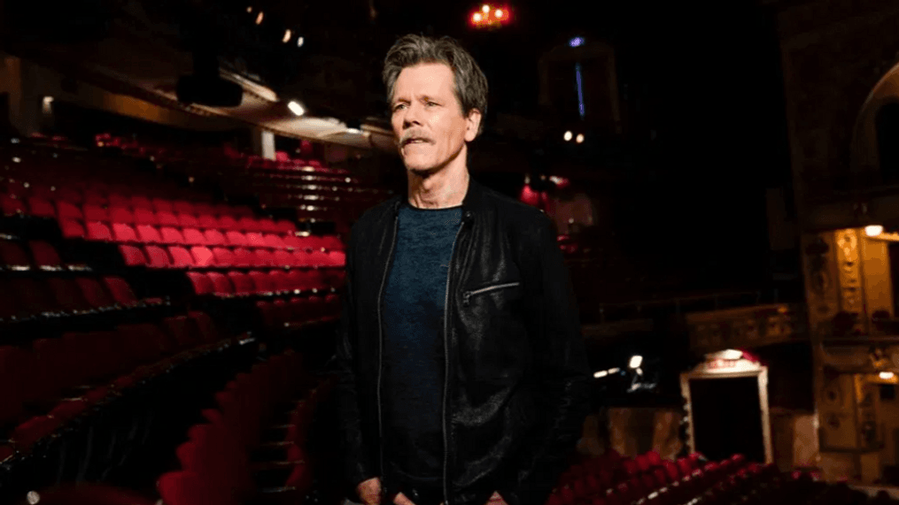 {p}This image released by CBS shows Kevin Bacon, who will co-host and executive produce “Play On: Celebrating The Power of Music to Make Change” a one-hour benefit concert special to raise funds for the NAACP Legal Defense and Educational Fund, Inc. (LDF) and WhyHunger. The special will be broadcast on Tuesday, Dec. 15 on CBS. (Michele Crowe/CBS via AP){/p}