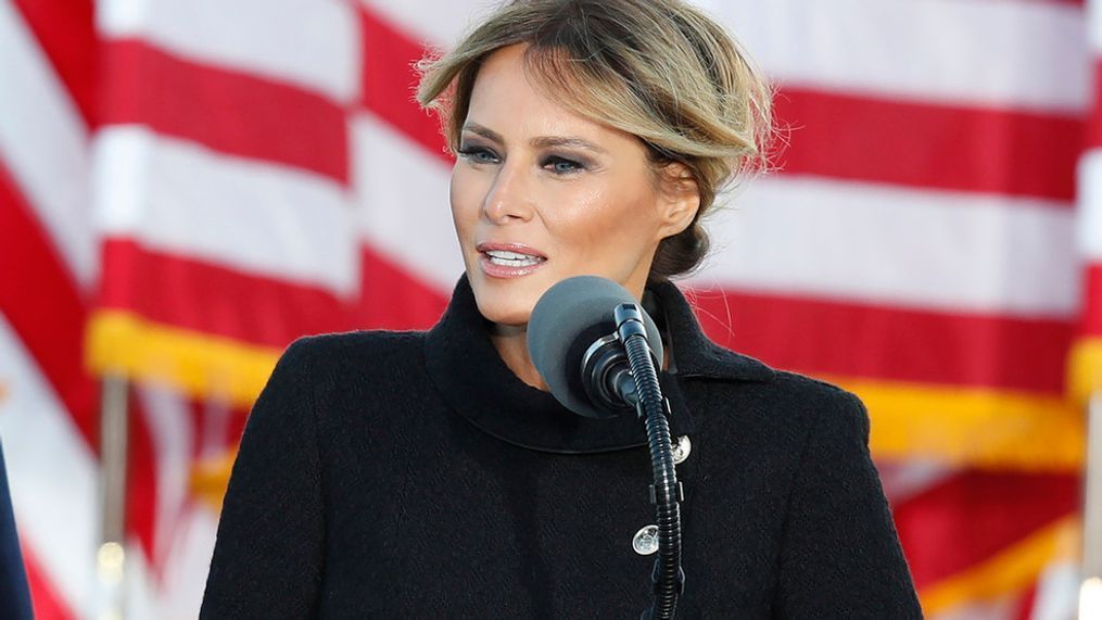 FILE - Then First lady Melania Trump speaks to a small group of supporters as President Donald Trump looks on at Andrews Air Force Base, Md., Jan. 20, 2021. Melania Trump is not expected to speak at next weekâs Republican National Convention, which will feature speeches by other Trump family members and a long list of GOP officials. The former first lady will attend the convention, but does not appear on a list of Â{&nbsp;}headliners and keynote speakers released by convention organizers Saturday, July 13.  (AP Photo/Luis M. Alvarez, File)