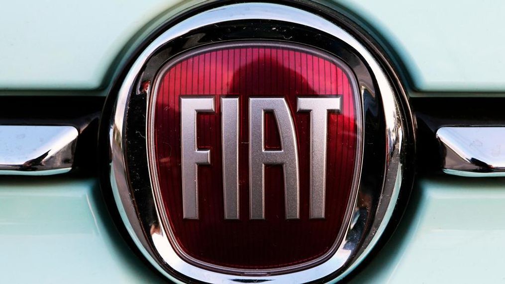 FILE - In this Oct. 31, 2019 file photo, a Fiat logo is pictured on a car in Bayonne, southwestern France. The United Auto Workers union has begun to focus bargaining on Fiat Chrysler, raising the possibility of another strike against a Detroit automaker. (AP Photo/Bob Edme, File)