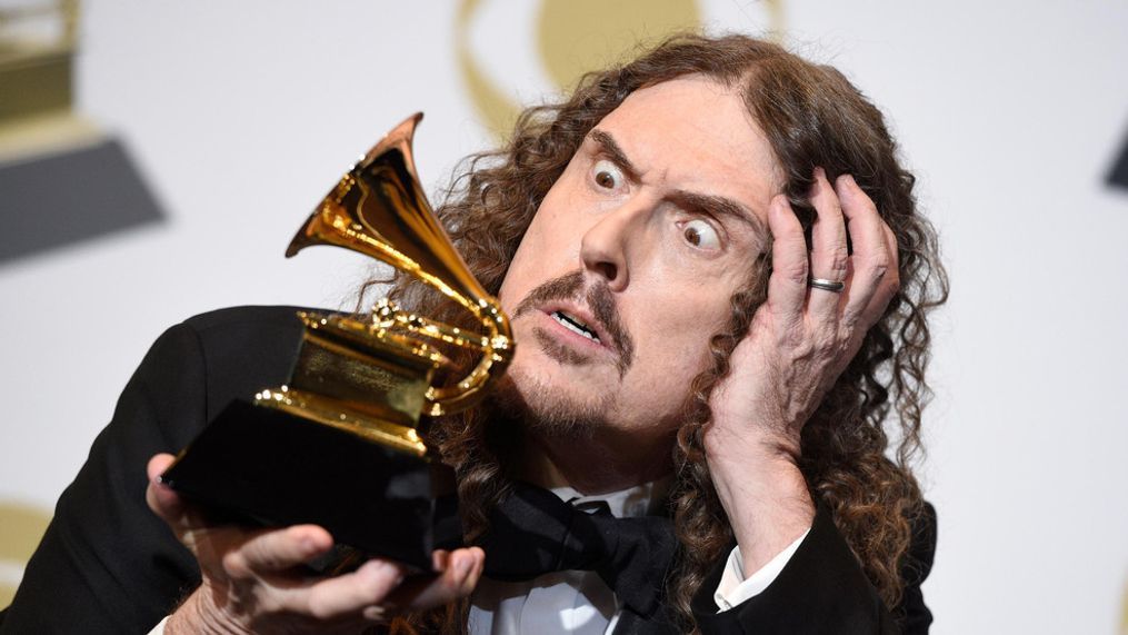 "Weird Al" Yankovic poses in the press room with the award for best boxed or special limited edition package for "Squeeze Box: The Complete Works of 'Weird Al' Yankovic" at the 61st annual Grammy Awards at the Staples Center on Sunday, Feb. 10, 2019, in Los Angeles. (Photo by Chris Pizzello/Invision/AP)