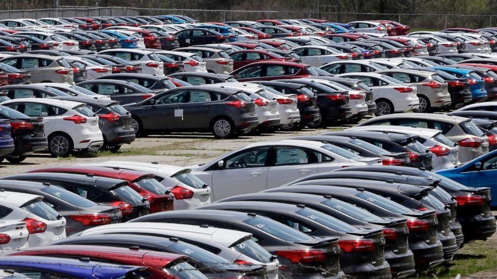 FILE - In this May 1, 2015, file photo Ford Focus vehicles are seen on a storage lot in Ypsilanti, Mich. Ford is extending the warranties on about 560,000 small cars to cover a litany of problems with a troubled six-speed automatic transmission. The latest move covers 2014 through 2016 model year Focuses built before Nov. 5, 2015, as well as 2014 and 2015 Fiestas built before Oct. 15, 2014. (AP Photo/Carlos Osorio, File)