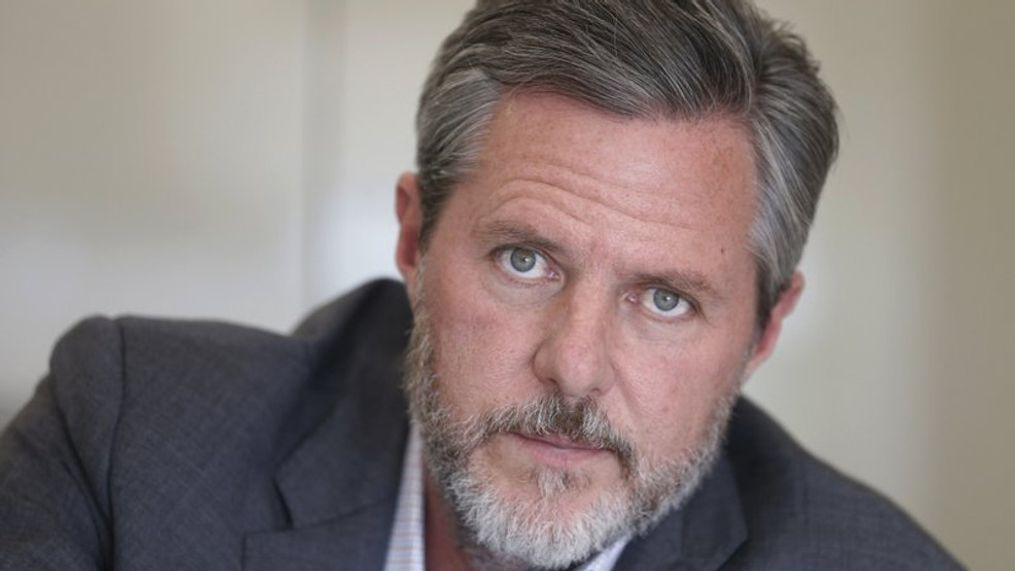 {p}FILE - In this Nov. 16, 2016, file photo, Liberty University president Jerry Falwell Jr., poses during an interview in his offices at the school in Lynchburg, Va. (AP Photo/Steve Helber, File){/p}