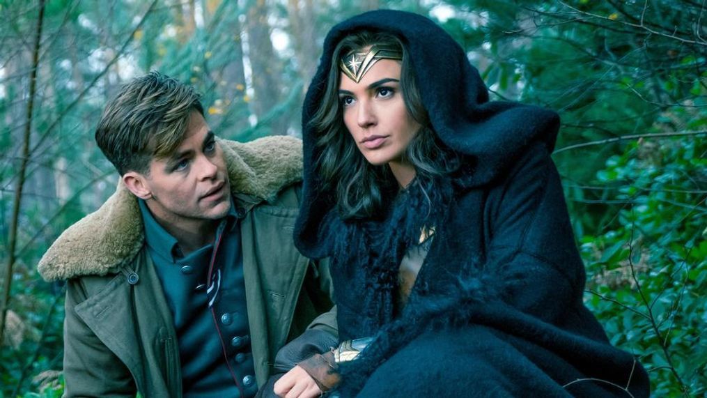 (L-R) CHRIS PINE as Steve Trevor and GAL GADOT as Diana in the action adventure "WONDER WOMAN," a Warner Bros. Pictures release. (Clay Enos/ TM & © DC Comics)