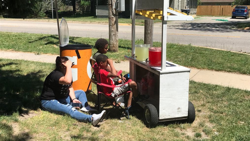 The lemonade stand seems like something you would normally see in a small town, but this stand is bridging a gap. Jon Jon and his family are one of the few handful of black families in the the predominately white town. (WWMT/Tarvarious Haywood)