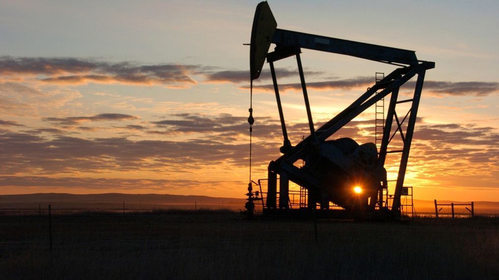 FILE - This Nov. 6, 2013 file photo shows a Whiting Petroleum Co. pump jack pulling crude oil from the Bakken region of the Northern Plains near Bainville, Mont. (AP Photo/Matthew Brown, File)