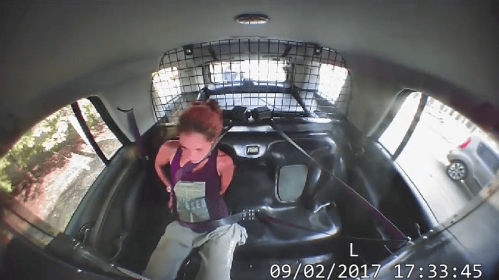 Newly released body-cam and dash-cam video shows the moment a woman escaped her handcuffs and stole a police car. (Lufkin Police Department)