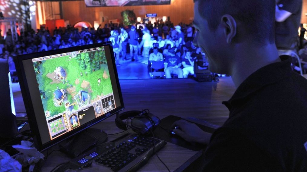 FILE - In this Aug. 7, 2009, file photo, a participant plays a computer game during the Intel Friday Night Game, a competition of the ESL, Electronic Sports League.