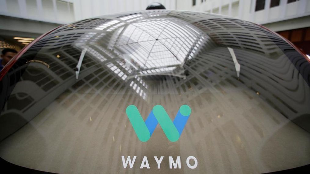 In this file photo, a skylight is reflected in the rear window of a Waymo driverless car during a Google event in San Francisco. Google's robotic car spin-off Waymo is poised to become the first to test fully driverless vehicles on California's public roads. (AP Photo/Eric Risberg, File)