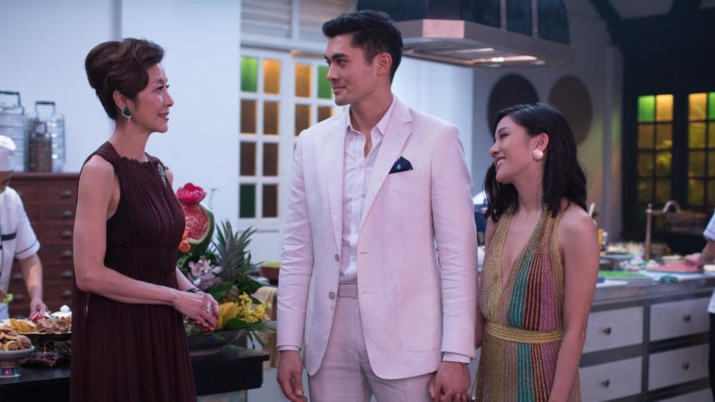 (L-R) MICHELLE YEOH as Eleanor, HENRY GOLDING as Nick and CONSTANCE WU as Rachel in Warner Bros. Pictures' and SK Global Entertainment's and Starlight Culture's contemporary romantic comedy "CRAZY RICH ASIANS," a Warner Bros. Pictures release. (Warner Bros.)