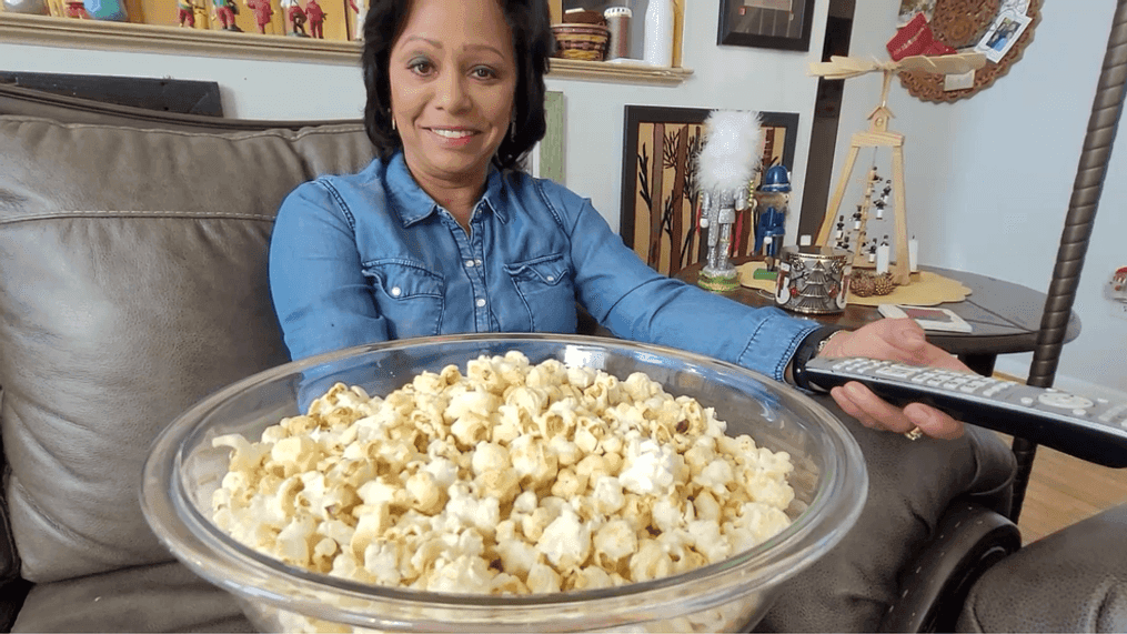 WJLA Meteorologist Veronica Johnson gets ready to enjoy a bowl of popcorn while she watches TV. (Photo: WJLA)