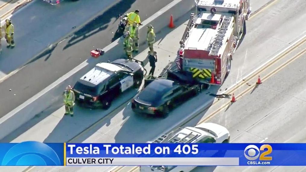 This Monday, Jan. 22, 2018 still frame from video provided by KCBS-TV shows a Tesla Model S electric car that has crashed into a fire engine on Interstate 405 in Culver City, Calif. Two federal agencies have dispatched teams to investigate the crash of the car that may have been operating under its semi-autonomous "Autopilot" system. National Transportation Safety Board send investigators to Culver City on Tuesday, while the National Highway Traffic Safety Administration confirmed Wednesday, Jan. 24, that it is also dispatching a special team "to investigate the crash and assess lessons learned." (KCBS-TV via AP)