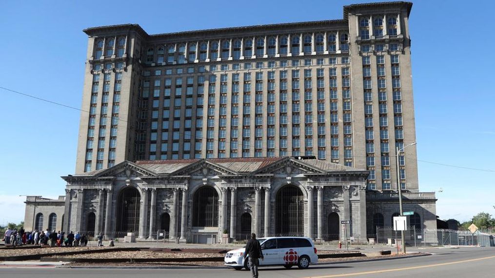 FILE - This Monday, June 11, 2018 photo shows the historic Michigan Central Station in Detroit. Ford Motor Co. is embarking on a 4-year renovation of the 105-year-old depot and 17-story office tower just west of downtown.  (AP Photo/Carlos Osorio)