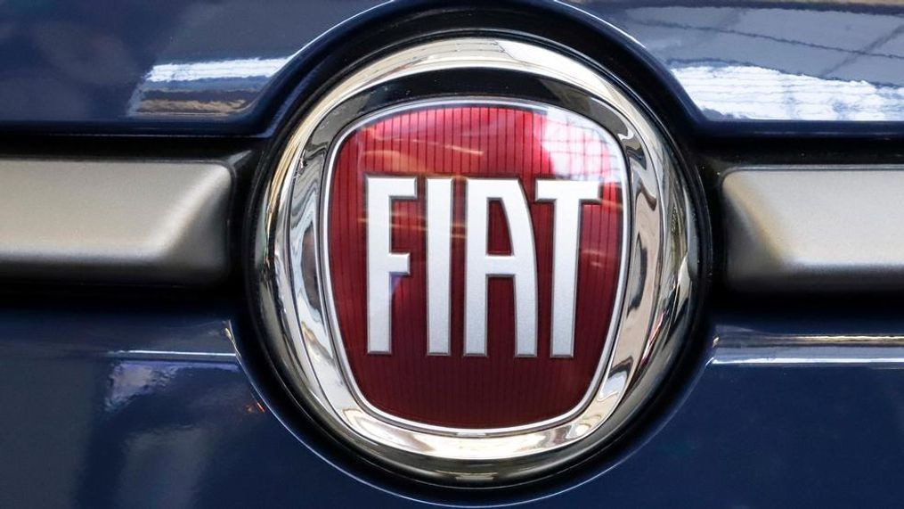 In this Feb. 14, 2019, file photo, this is the Fiat logo is mounted on a 2019 500 L on display at the 2019 Pittsburgh International Auto Show in Pittsburgh. Fiat Chrysler is proposing a merger with French carmaker Renault aimed at saving billions of dollars for both companies. (AP Photo/Gene J. Puskar, File)