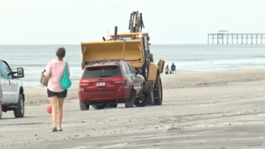 Jeep stuck on Myrtle Beach during Dorian removed (WPDE)