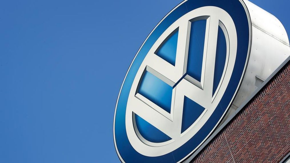 In this file photo, the logo of Volkswagen is seen on top of a company building in Wolfsburg, Germany. German automaker Volkswagen reports its third quarter earnings on Tuesday, Oct. 30. (AP Photo/Michael Sohn, file)