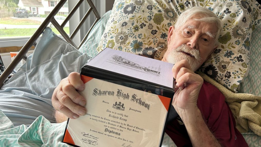 98-year-old Richard Remp receives a high school diploma, 71 years after he dropped out of high school to fight the Nazis during World War II. (WJLA){&nbsp;}