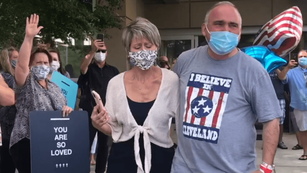 Cleveland Mayor Kevin Brooks and his wife Kim walked out of the hospital Friday to applause and support. (Screenshot taken from video provided by viewer Linda White)