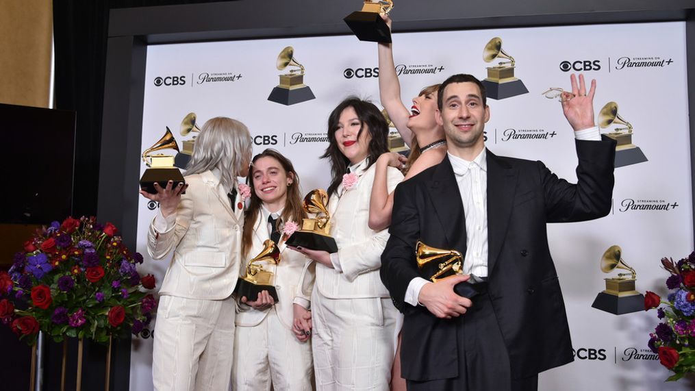 Phoebe Bridgers, from left, Julien Baker, and Lucy Dacus of boygenius pose in the press room with the awards for best rock performance and best rock song for "Not Strong Enough," and best alternative music album for "The Record." Taylor Swift, center right, and Jack Antonoff pose with the award for record of the year for "Midnights" during the 66th annual Grammy Awards on Sunday, Feb. 4, 2024, in Los Angeles. (Photo by Richard Shotwell/Invision/AP)