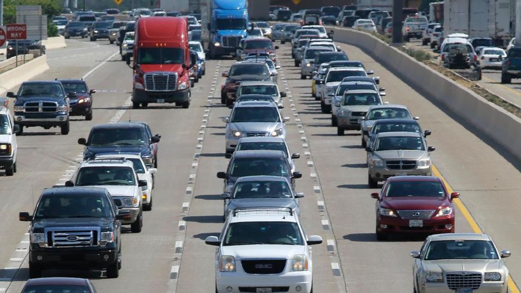 In this July 1, 2016 file photo, drivers work their way out of Dallas during rush hour. The U.S. government's road safety agency says traffic deaths fell by a small amount for the second straight year. The National Highway Traffic Safety Administration attributed the 2.4% drop partially to technology in newer vehicles that can prevent crashes. The agency says the downward trend is continuing into 2019. First-half estimates show fatalities down 3.4%. (AP Photo/LM Otero, File)