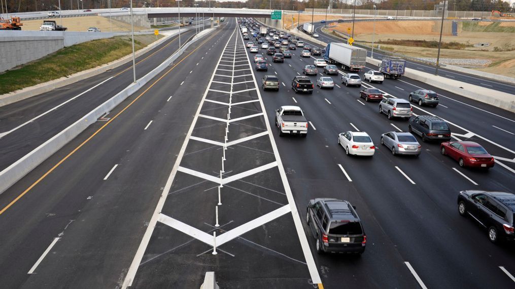 Soon to be opened express lanes are empty, left, as northbound traffic is heavy on Interstate 495, the Capital Beltway, near Tysons Corner in Fairfax County, Va., Saturday, Nov. 10, 2012. The $2 billion, 14-mile, decade-in-the-making Express Lanes are set to open Nov. 17. The four Express Lanes, two northbound and two southbound, supplement the existing eight lanes on the Virginia side of the Beltway. (AP Photo/Cliff Owen)