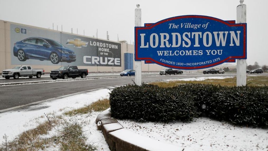 FILE- In this Nov. 27, 2018, file photo a banner depicting the Chevrolet Cruze model vehicle is displayed at the General Motors' Lordstown plant in Lordstown, Ohio. General Motors is selling the Ohio assembly plant it closed in March to a new company that plans to begin making electric trucks in late 2020. The company called Lordstown Motors Corp. said Thursday, Nov. 7, 2019, that it initially intends to hire 400 production workers but still needs more money from investors. (AP Photo/John Minchillo, File)