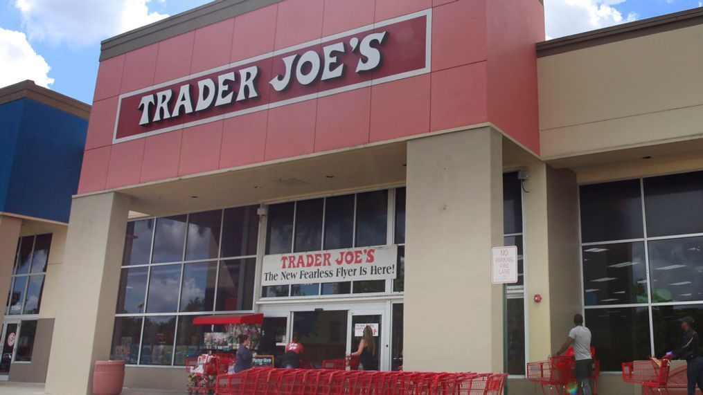 FILE - People stand in line waiting to enter Trader Joe's to buy groceries in Pembroke Pines, Fla., on March 24, 2020. More than 61,000 pounds of steamed chicken soup dumplings sold at Trader Joe's are being recalled for possibly containing hard plastic, U.S. regulators announced Saturday, March 2, 2024. (AP Photo/Brynn Anderson, File)