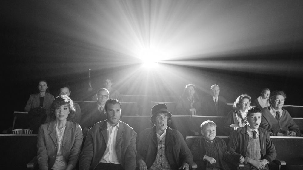 Caitriona Balfe, from left, Jamie Dornan, Judi Dench, Jude Hill and Lewis McAskie appear in a scene from "Belfast." (Rob Youngson/Focus Features via AP)