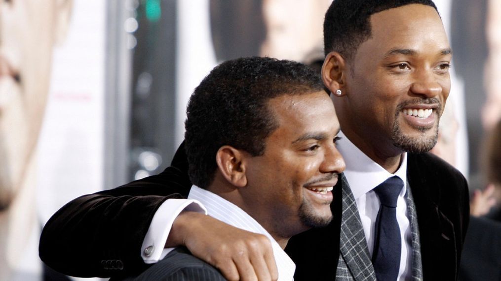 FILE - In this Dec. 16, 2008, file photo, Will Smith, right, and Alfonso Ribeiro pose together at the premiere of "Seven Pounds" in Los Angeles. (AP Photo/Matt Sayles, File)