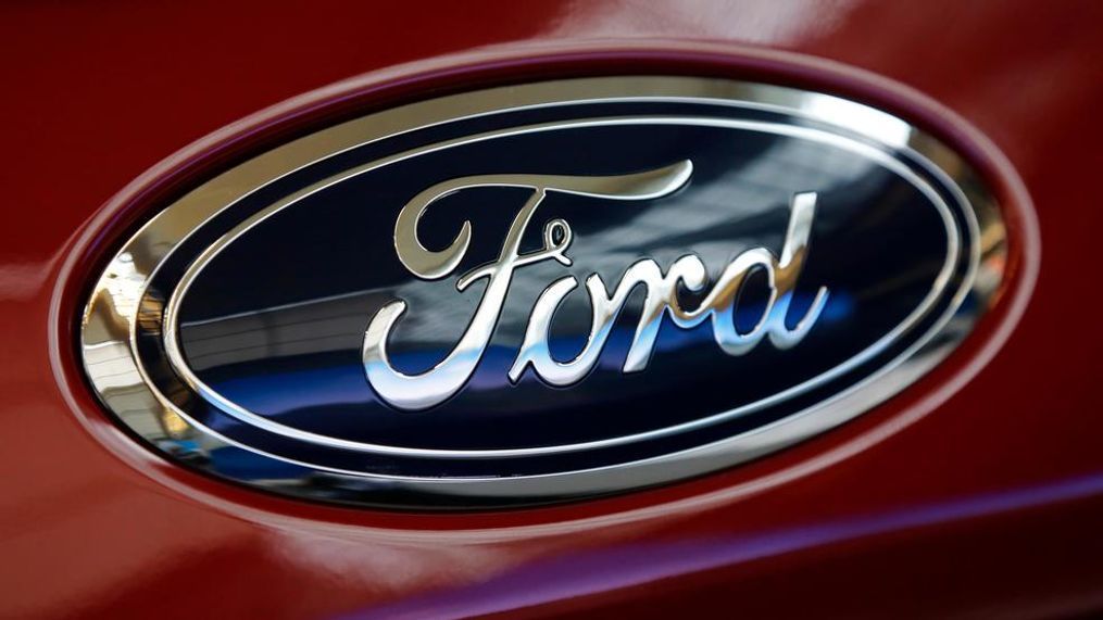 This file photo shows a Ford logo on a 2018 Expedition 4x4 on display at the Pittsburgh Auto Show. U.S. auto companies such as General Motors, Tesla and Ford faltered this year in Consumer Reports' reliability rankings as readers reported more mechanical trouble and fewer problems with infotainment systems. (AP Photo/Gene J. Puskar, File)