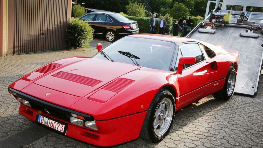 A Ferrari 288 GTO is pictured in Grevenbroich, Germany, May 15, 2019. German police have recovered a valuable 1980s Ferrari stolen during a test drive and are now searching for the man who is believed to have sped off with the car while posing as a would-be buyer. The red Ferrari 288 GTO, first registered in 1985, is believed to be worth more than 2 million euros ($2.2 million). (Dieter Staniek/dpa via AP)