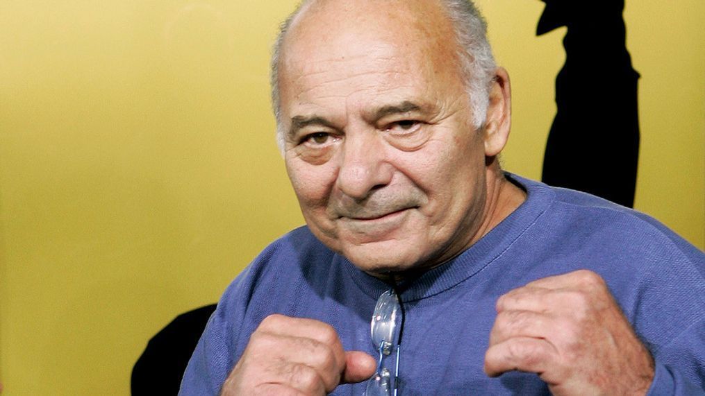 FILE - Burt Young, a cast member of the film "Rocky Balboa," gestures at the premiere of the film in Los Angeles, Dec. 13, 2006. (AP Photo/Kevork Djansezian, File)