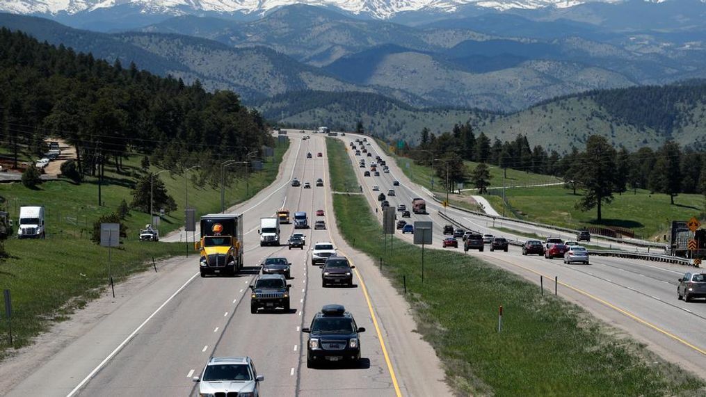 In this file photo, motorists guide their vehicles down Interstate 70 near Evergreen, Colo. Drivers expect insurance companies to offer digital experiences on par with the likes of Amazon, Uber and Netflix. Insurers are far from meeting those expectations, but they’re stepping up their game in the battle for customers. Today, auto insurance companies are using technology to change how they set prices, give discounts, answer common questions and handle claims. (AP Photo/David Zalubowski, File)